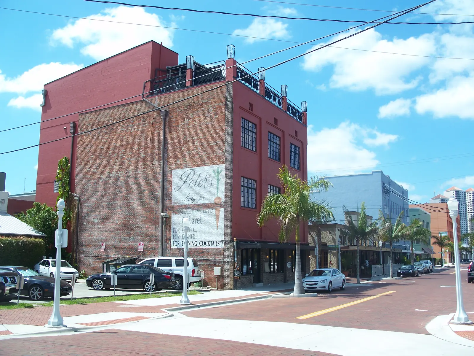Brick streets and historic storefronts in the Fort Myers Downtown Commercial District, where the River District holds its New Year's Eve street party.