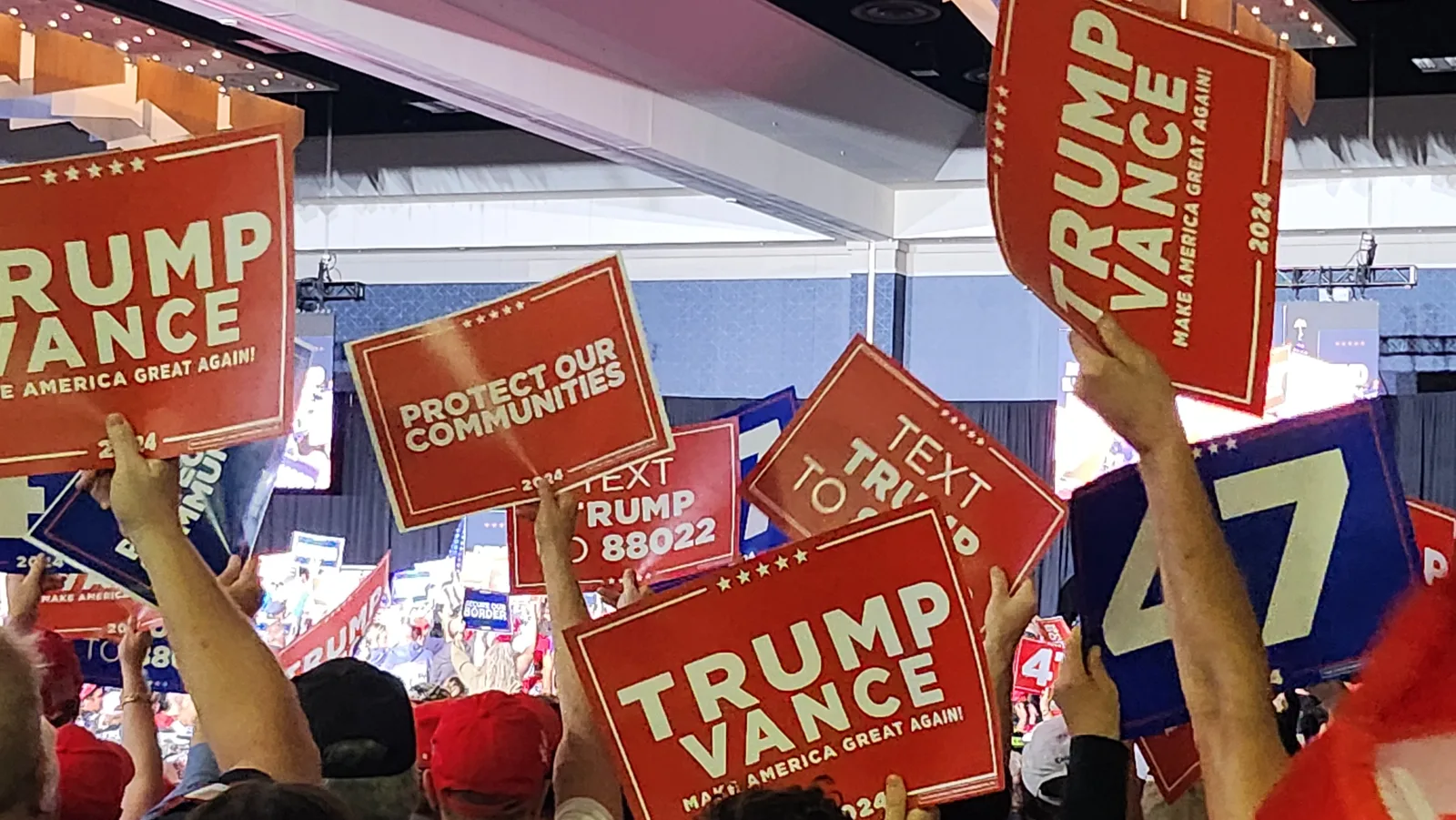 Supporters hold up campaign signs at a Donald Trump rally in Aurora, Colorado. The picture does not show the Fort Myers event.