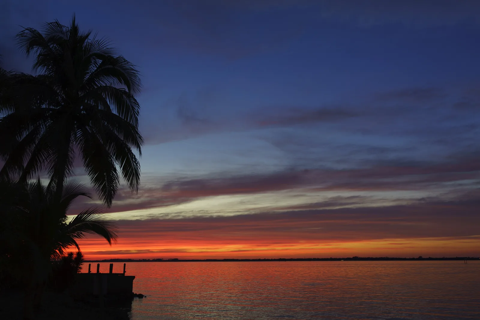 Sunset over the Caloosahatchee River from the Ford estate at the Edison and Ford Winter Estates in Fort Myers.